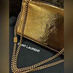 Yves Saint Laurent Gold metallic purse with gold strap